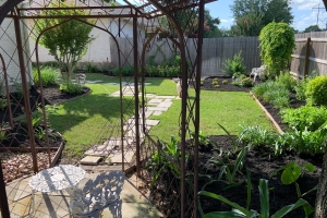 gazebo with stone walkway and landscaping design