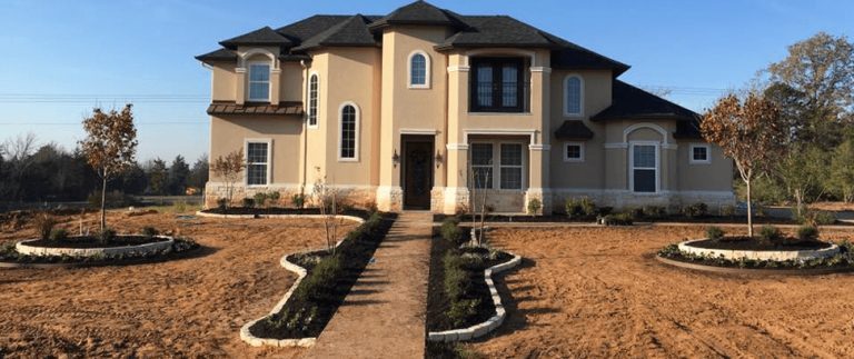 luxury home landscape installation, white limestone, bryan landscapes