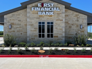 First Financial Bank Bryan TX landscape installation. rock boulder, commercial landscape