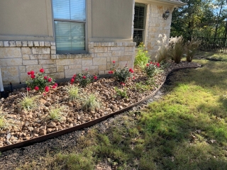 bull rock with landscaping and custom border
